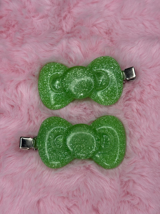 green glitter bow clips